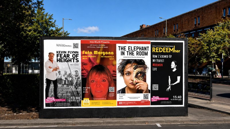 Edinburgh Fringe advertising posters on a city billboard